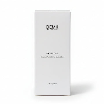 DEMK By Lily Hart Skin Oil — organic castor and jojoba facial oil concentrate, in box packaging.