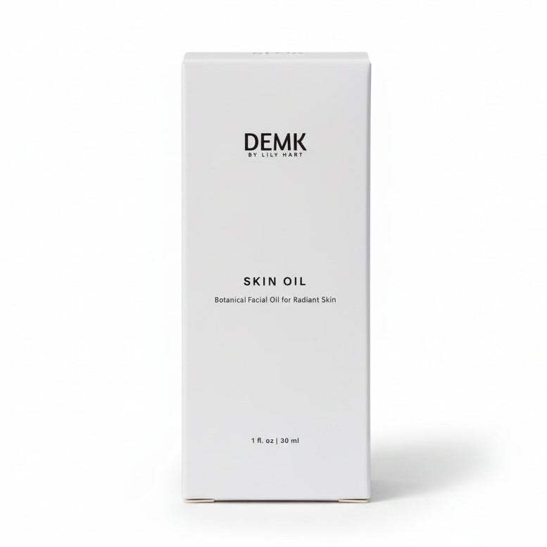 DEMK By Lily Hart Skin Oil — organic castor and jojoba facial oil concentrate, in box packaging.